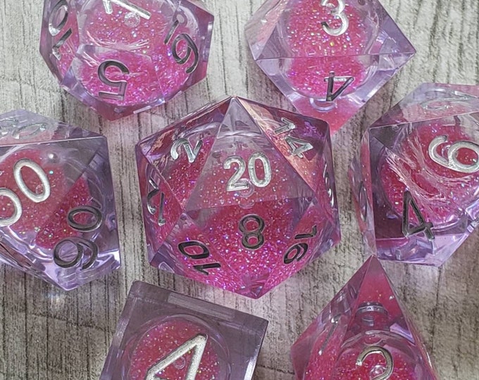 Featured listing image: LIQUID CORE - Pink Dragon, Sharp Edge Silver Font 7 pc dice set | Dragon Hoard | Tabletop RPG | Dice Goblin | d20 system | dnd