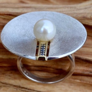 Ring pearl, blue sapphire, silver matt, partially gold-plated, size 58