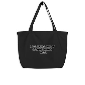 May include: Black tote bag with white text that reads "Ludicrously Capacious Bag".