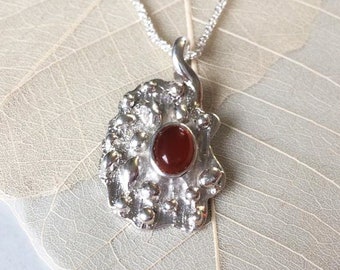 Carnelian silver pendant, silver 925, statement pendant, red carnelian on embossed structure, gorgeous extravagant design, unique