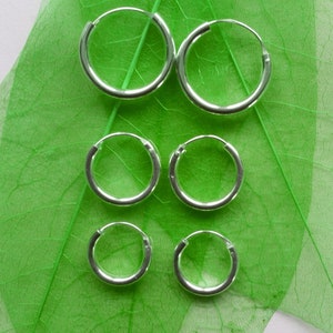 Hoop earrings 2.4 mm wide, simple and elegant, silver 925, shiny silver, three sizes available, discreet, versatile