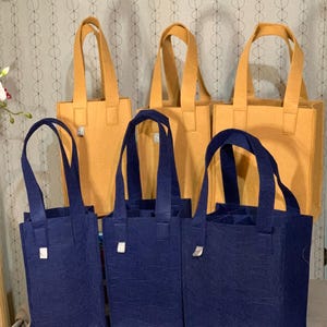 Zusammenklappbare Tasche mit rekonfigurierbaren Fächern (2 Flaschen, 4 Flaschen, 6 Flaschengrößen)