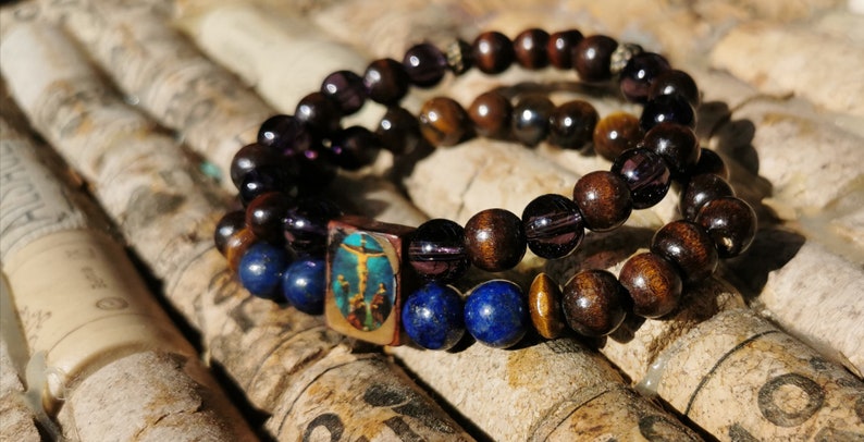 Handmade semi-precious stone and wood with the effigy of Christ bracelet.