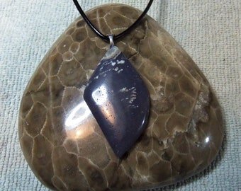 Unique and beautiful Freeform Shaped Leeland Blue pendant; Leeland Michigan Slag glass. With silver plated bail and leather cord.