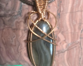 Exquisite Copper Wire Wrapped Lake Superior Agate Pendant with Leather Cord.