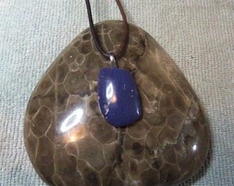 Unique and beautiful Freeform Shaped Leeland Blue pendant; Leeland Michigan Slag glass. With silver plated bail and leather cord.