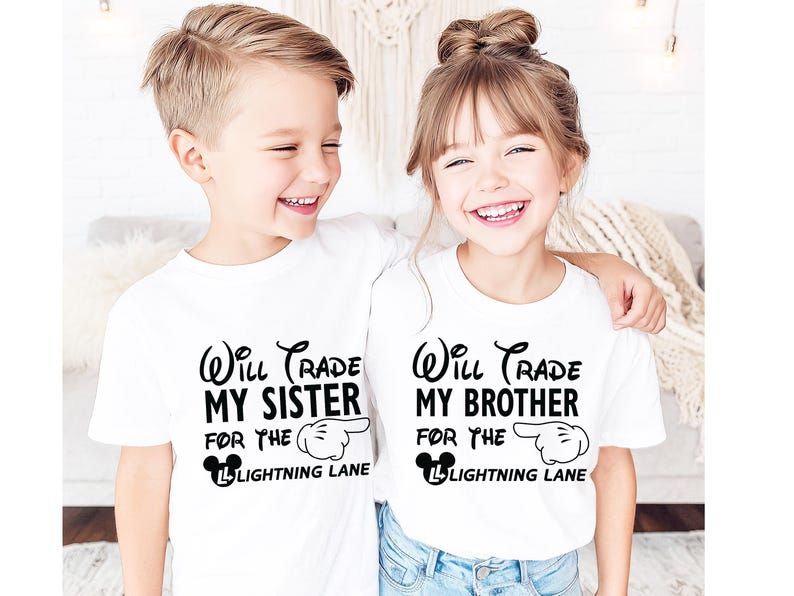 May include: Two children wearing white t-shirts with black text. The shirts read "Will Trade My Sister For The Lightning Lane" and "Will Trade My Brother For The Lightning Lane". The text is in a whimsical font with a Mickey Mouse hand pointing to the right.