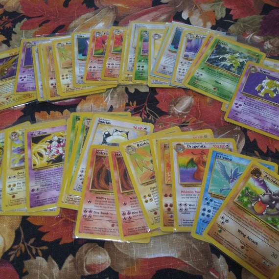 Pokmon Cards Pokmon Mystery Card Pack  15 Cards Per Pack With 5 Holo  Cards Guaranteed! Featuring Charizard, Pikachu & More Prize Pack Series Cards  Pokmon TCG Cards