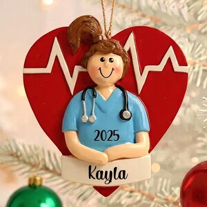Personalized Nurse Ornament 2025, Nurse Christmas Gift, New Nurse Ornament Customized with the name, Gift for a Best Nurse or Medical Worker image 1