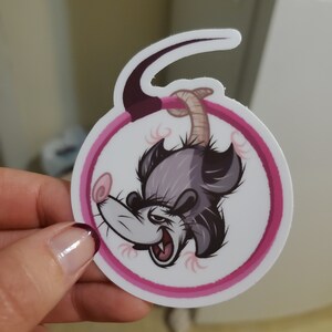 Opossum in a lyra
