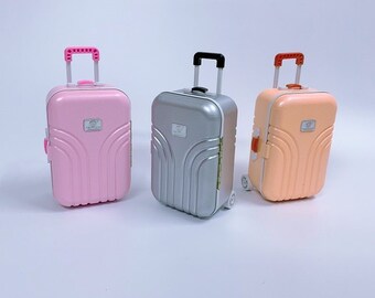 barbie with a suitcase
