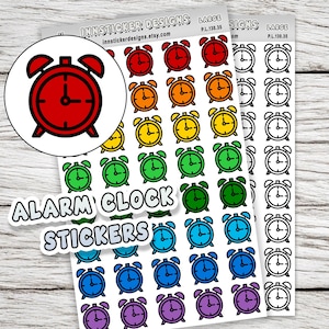 May include: Sheets of colourful alarm clock stickers. The stickers feature a variety of colours, including red, orange, yellow, green, blue, and purple. The text "ALARM CLOCK STICKERS" is visible on a white background. The stickers are designed with a black outline.