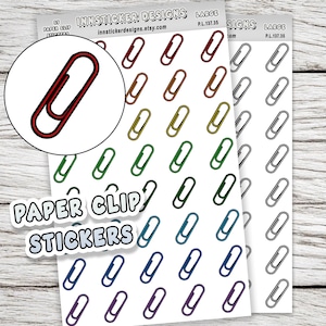 May include: Sheets of paper clip stickers in various colors, including red, green, blue, and black. The stickers are arranged on a white background. The text "PAPER CLIP STICKERS" is also visible.