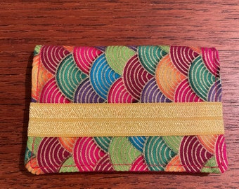 Small envelope wallet with elastic band