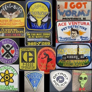 May include: A collection of colorful embroidered patches featuring various themes, including a nuclear power plant, a detective agency, a prison, a psychiatric hospital, and a camp counselor. The patches are all rectangular and have a variety of designs and colors.