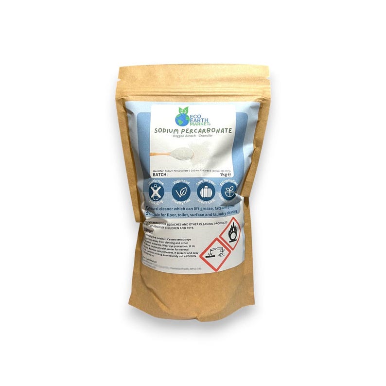 May include: A brown paper bag of Eco Earth Market Sodium Percarbonate. The bag has a blue and white label with the product name and a graphic of a scoop of powder. The bag contains 1 kg of product.