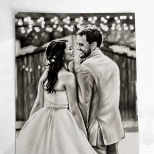 May include: A black and white drawing of a couple in formal attire, the woman in a white dress and the man in a suit, standing close together and looking at each other. The background is blurred and features string lights.