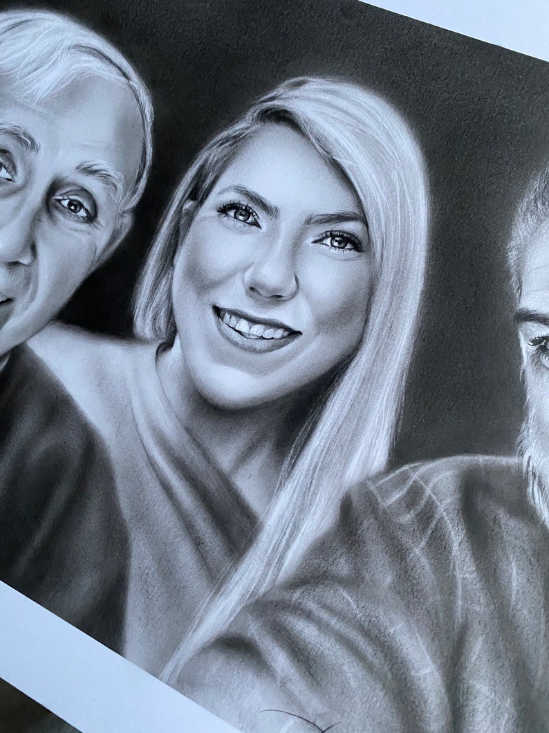 May include: A black and white portrait drawing of three people. The woman in the center is smiling and has long hair. The man on the left is looking at the camera. The man on the right is looking to the left.