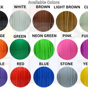 May include: A chart displaying 15 different colours of filament for 3D printing. The colours include black, white, brown, light brown, clear, orange, green, neon green, pink, fuchsia, purple, red, blue, stone, and yellow.