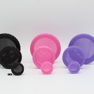 May include: Three sets of round, mesh-covered lids in black, pink, and purple. Each set includes three lids in different sizes: 1 inch, 2 inches, and 3 inches.