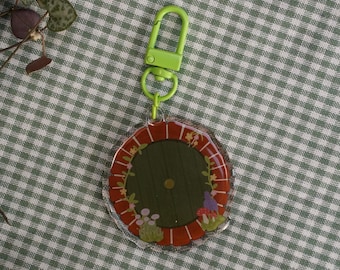Hobbit Tür Blumen Acryl Epoxy Schlüsselanhänger | Niedlicher, steinerner Hobbit, Herr der Ringe
