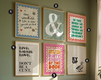 May include: A gallery wall set of six framed prints featuring various typography and illustrations. The prints include phrases like How Wonderful life is now you're in the World, & Chill, In this house we laugh, Live Laugh Love, Leave your drama, and Ey Up.