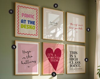 May include: A gallery wall set of six framed prints with gold frames. The prints feature various text designs including 'PANIC AT THE DESKO', 'how lucky are we?', 'the ref can't hear you babe x', 'Hugs in the hallway x', 'IT'S A FOREVER THING' with a heart, and 'THIS IS A HIGH CLASS JOINT. PLEASE ACT ACCORDINGLY'.