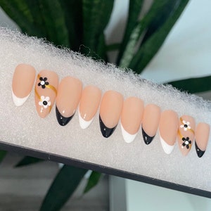 Black and white tips w/ floral design | Gel press on nails