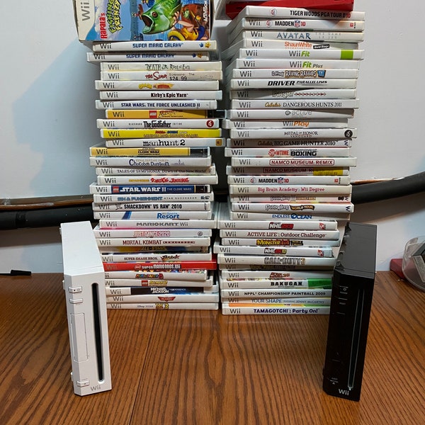 Wii console + Games Mario bros Kart Galaxy tennis brawl wii sports resort lego batman star wars simpsons sonic  donkey kong etc