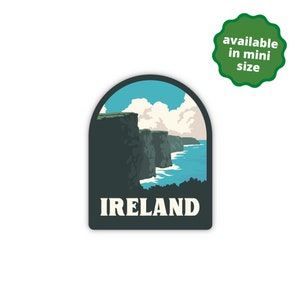 May include: A green and blue sticker with a scenic view of the Cliffs of Moher in Ireland. The sticker has the word "IRELAND" printed in white letters at the bottom.