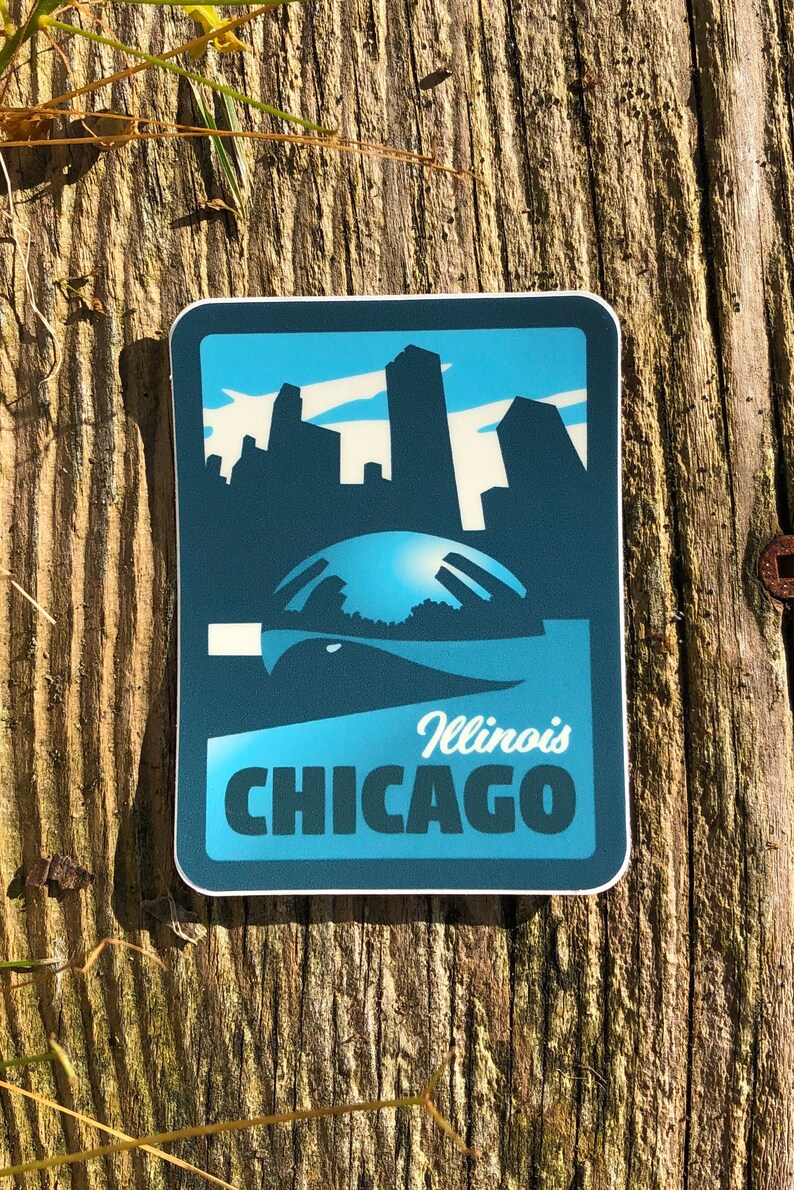 May include: A blue and white sticker with a silhouette of the Chicago skyline and the text "Illinois CHICAGO".