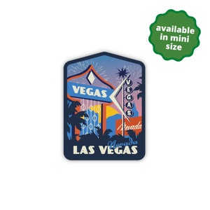 May include: A blue and orange retro-style sticker with a sign that says "Vegas" and the text "Las Vegas, Nevada". The sticker has a sunset background with palm trees and fireworks.