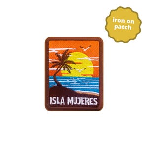 May include: Embroidered patch depicting a sunset over the sea, with a palm tree and the words "ISLA MUJERES." The patch has a brown border and a yellow "iron on patch" tag.