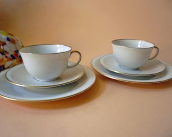 Conjunto de duas xícaras de chá e pratos de bolo Fürstenberg com bordas douradas, da década de 1960. Xícaras de chá, xícaras colecionáveis, xícaras de café - vintage.