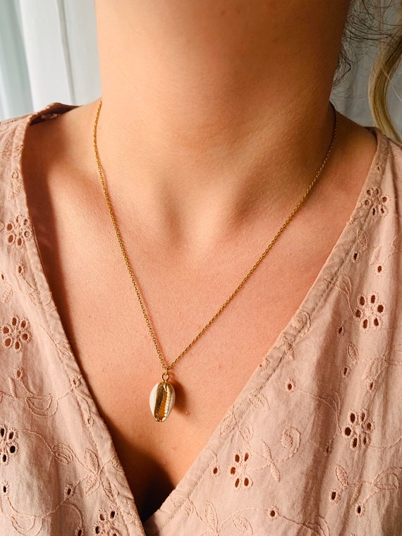Gold cowrie shell sale necklace