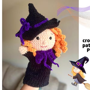May include: Crocheted witch puppet with a black hat, orange hair, and a purple bow. The puppet has a light skin tone and a purple scarf. The text "crochet pattern PDF" is visible.