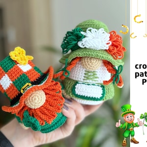 May include: Crochet pattern PDF for two amigurumi gnomes. One gnome wears a green and orange hat with a white and green plaid pattern. The other gnome wears a green hat with white and orange flowers. Both gnomes have white beards and red hair.