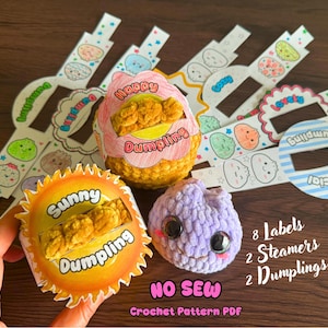 May include: A crochet pattern PDF set featuring two plush dumplings, two steamers, and eight paper labels. The labels include text such as Happy Dumpling, Sunny Dumpling, Cozy, Lovely, and Special. The set is labelled as No Sew Crochet Pattern PDF.