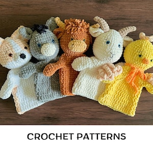 May include: A collection of five handmade crochet animal puppets, including a bear, donkey, cow, goat, and chick. Each puppet is made with soft yarn in various colors and features detailed facial features. The text "CROCHET PATTERNS" is at the bottom.