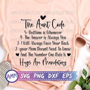 May include: Peach-colored t-shirt with the text "The Aunt Code" and a list of rules, including "Hugs Are Mandatory." The design includes a heart symbol and is accompanied by sunglasses and a pair of shoes.