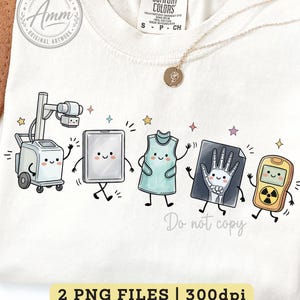 May include: A cream-colored t-shirt featuring a graphic of five anthropomorphic medical imaging items including an X-ray machine, a tablet, a lead apron, an X-ray film of a hand, and a radiation detector, all decorated with small colorful stars.