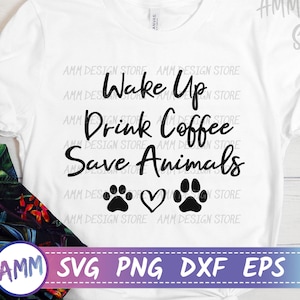 May include: White t-shirt with black text that reads "Wake Up Drink Coffee Save Animals" with two paw prints and a heart in between.