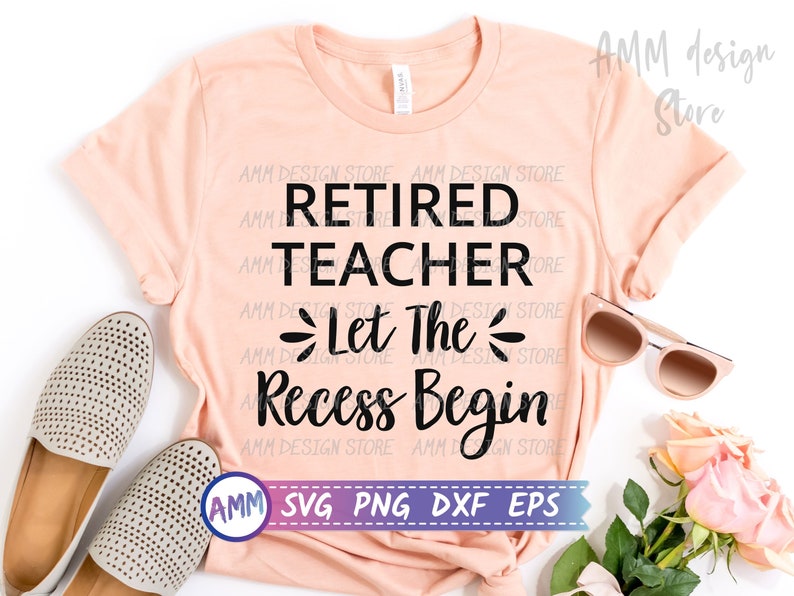 May include: A peach-colored t-shirt with black text that reads "Retired Teacher - Let The Recess Begin". The text is in a cursive font. The shirt is laying flat on a white surface with sunglasses, shoes, and flowers.