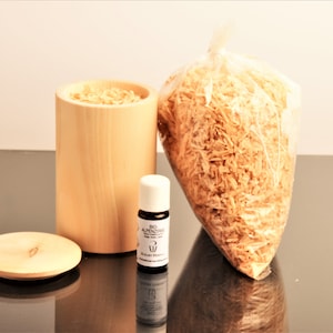 Stone pine fragrance tin with stone pine flakes and 10ml stone pine oil