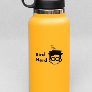 May include: A yellow stainless steel water bottle with a black lid and a black and white graphic of a bird on a person's head with the text "Bird Nerd".