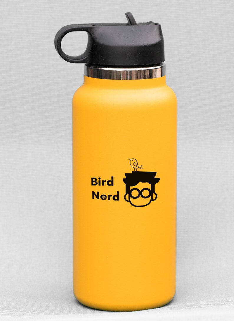 May include: A yellow stainless steel water bottle with a black lid and a black and white graphic of a bird on a person's head with the text "Bird Nerd".