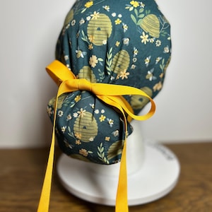 Nurse Scrub Cap: Beehive Print, Yellow Ribbon - Ponytail Style
