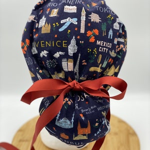 Navy Bon Voyage Fabric Scrub Cap: World Traveler Ponytail Hat