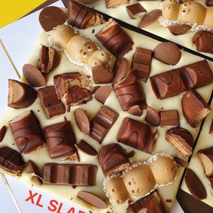 kinder chocolate slab kinder bueno. kinder sticks. kinder hippos. chocolate buttons image 3