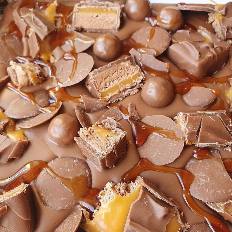 mars bar covered belgium milk chocolate. kinder bueno. kinder mars bars. maltesers. chocolate buttons. caramel image 5
